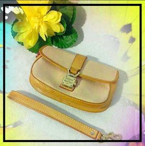 Dooney and Bourke Push Lock Wristlet Wallet